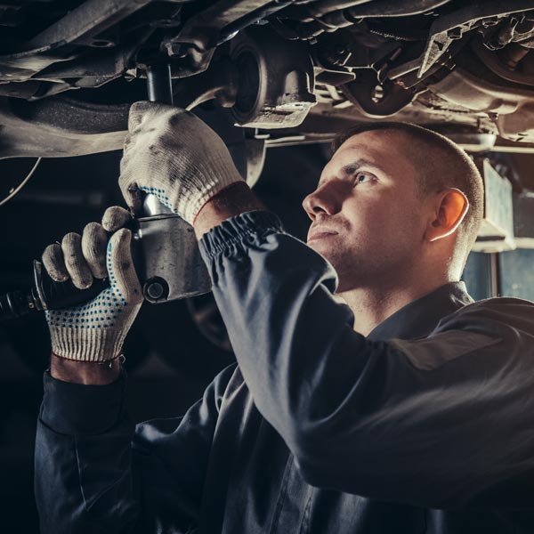 mechanic working on car